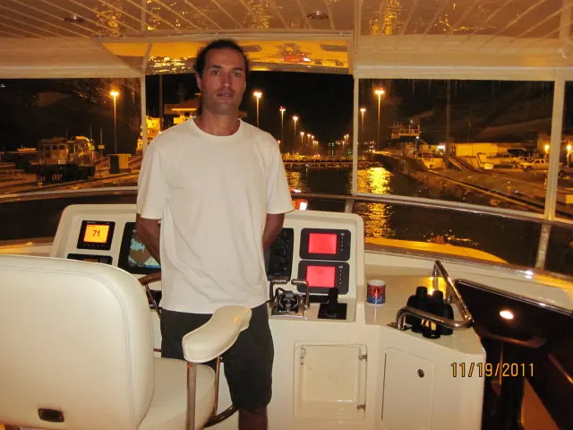Captain Assen at the helm on an offshore delivery